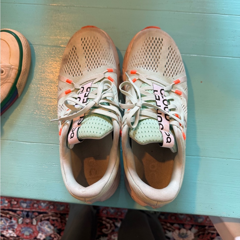 On Running Cloudsurfer 7 in Teal/Turquoise and and Orange Running Shoes